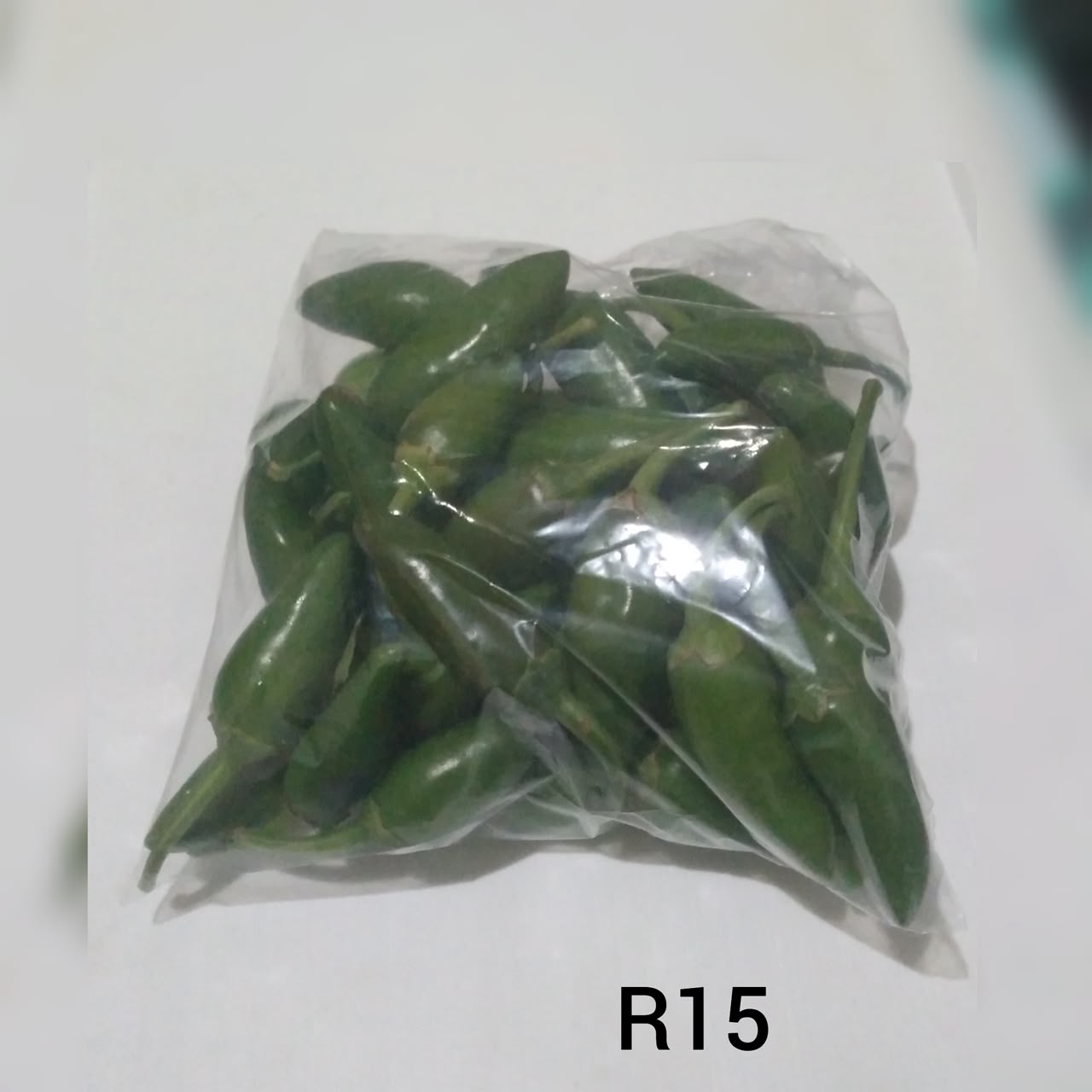 KRS green chillies packed and priced for sale